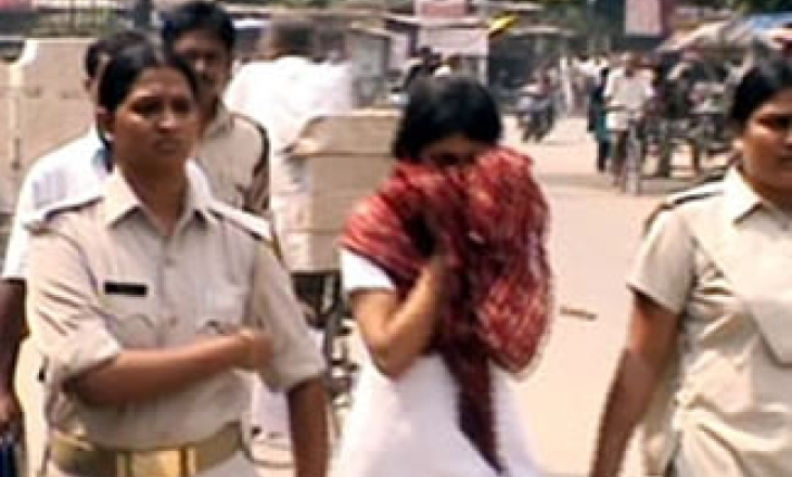 UP cops parade girl